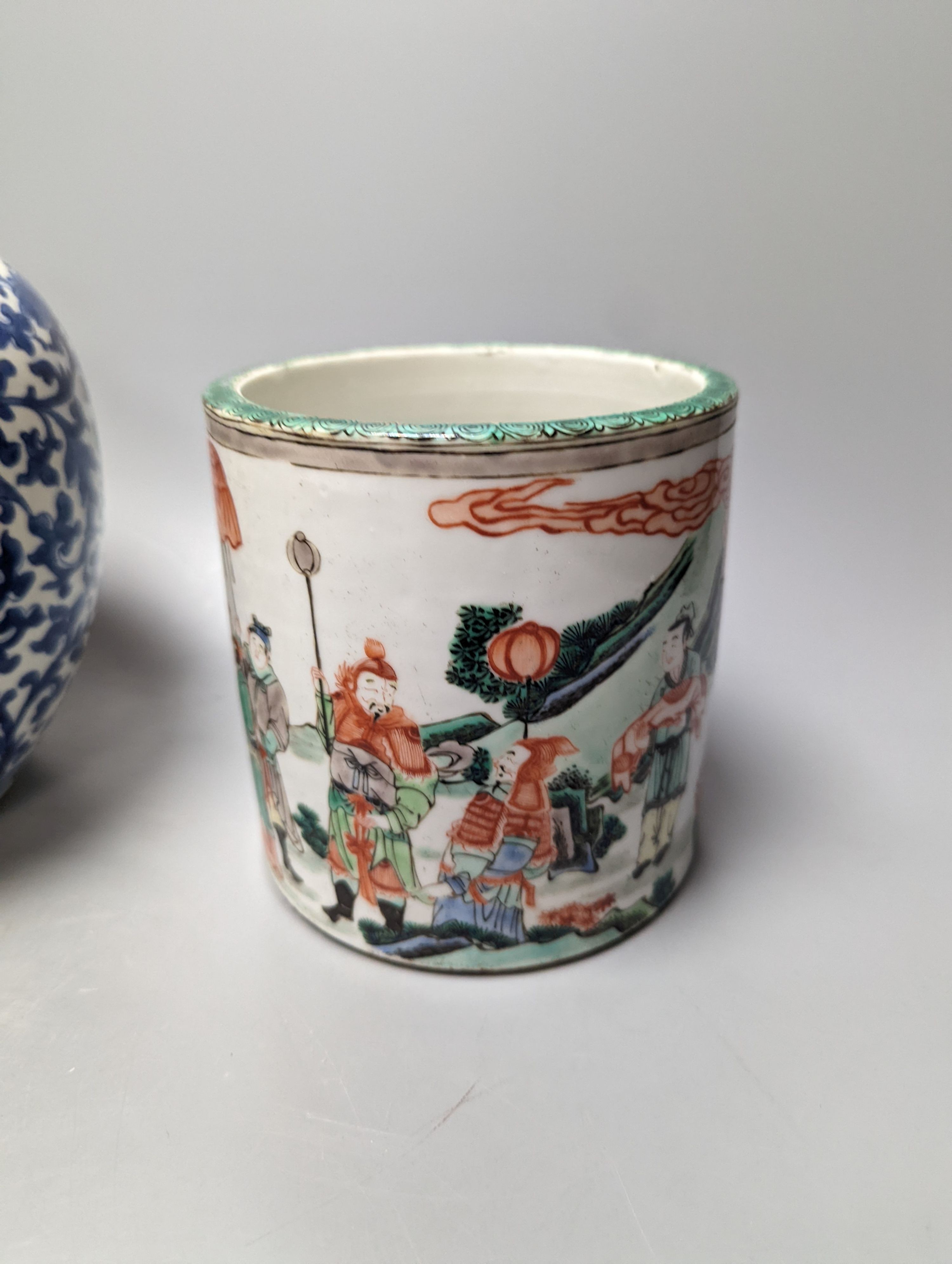 An Imari Japanese dish, a blue and white phoenix jar, and a famille verte brush pot with officials. Largest 29cm diameter
